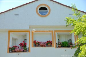 Foto Casa decorada con geranios en Guadalix 6